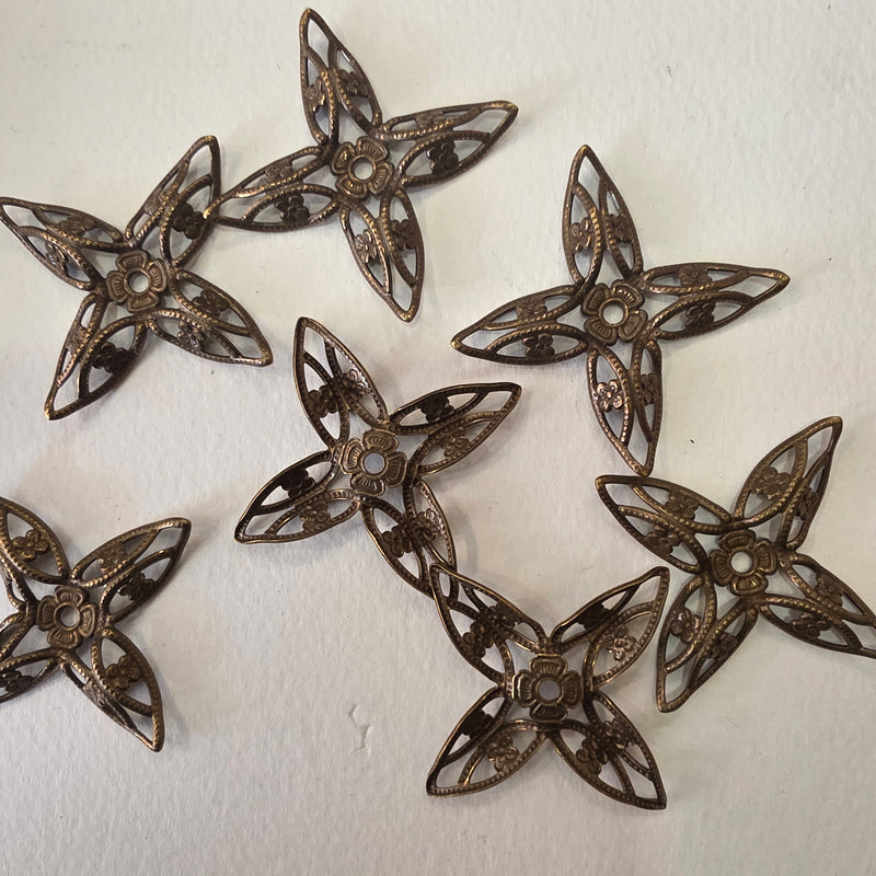 Metallic flower filigree with old silver bath