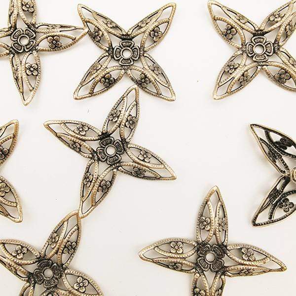 Filigrana flor metalida con baño plata vieja MENONI CENTROARTESANO