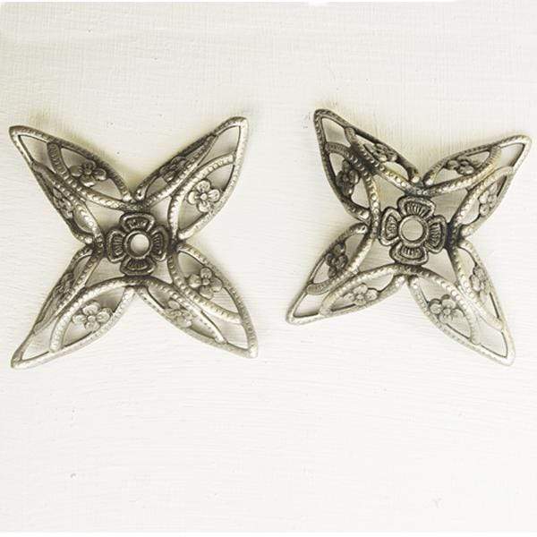 Filigrana flor metalida con baño plata vieja MENONI CENTROARTESANO