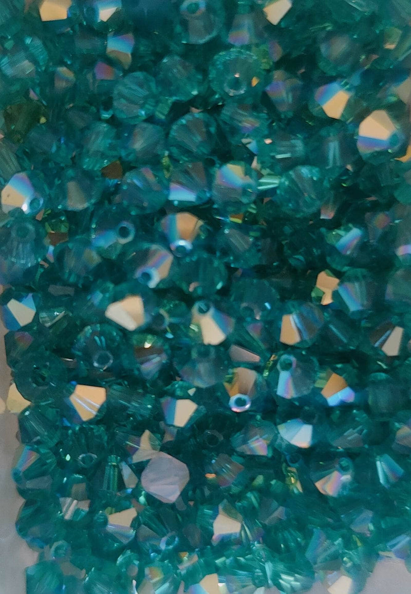 Swarovski tupi 4mm 25ud Blue Zircon AB SWAROSKI CENTROARTESANO