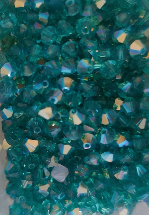 Swarovski tupi 4mm 25ud Blue Zircon AB SWAROSKI CENTROARTESANO