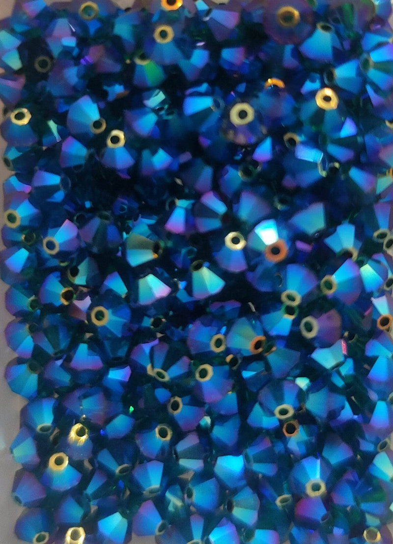 Swarovski tupi 4mm 25ud Emerald AB2B SWAROSKI CENTROARTESANO