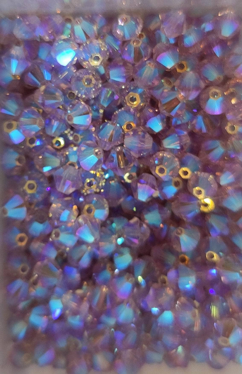 Swarovski tupi 4mm 25ud light amethyst AB2B SWAROSKI CENTROARTESANO