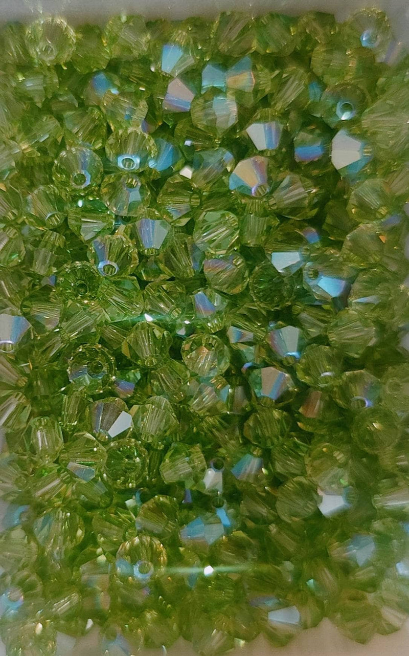 Swarovski tupi 4mm 25ud Peridot  AB SWAROSKI CENTROARTESANO