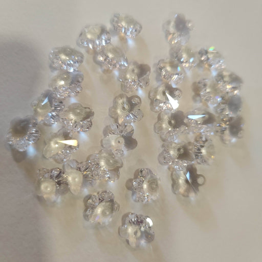 Swarovski Flor de 12mm agujero de 1,2mm en petalo color Cristal SWAROVSKI CENTROARTESANO